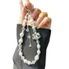 Nueva Cadena para Teléfono Móvil Kt con Lazo y Borla, Colgante Lindo de Perlas de Cristal Hecho a Mano, Venta al por Mayor