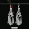 Brincos de borla de prata Miao artesanais estilo étnico vintage temperamento feminino Yunnan Miao personalidade estágio brincos longos versáteis