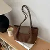 Bolso de hombro vintage transfronterizo de ante para mujer, nuevo modelo 2026, de alta gama, moderno, versátil, de gran capacidad, con estampado de leopardo, para llevar debajo del brazo