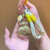 Regalos del Festival del Medio Otoño para Clientes: Pasteles de Luna, Bolsas de la Suerte, Dijes Dorados para Teléfono, Llaveros, Cadenas para Teléfono, Dijes para Bolsos