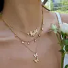Europa Cruzada Comercio Electrónico Estilo INS Temperamento Acero de Titanio Incrustaciones de Pedrería Lujo Ligero Acero Inoxidable Chapado en Oro 18k Collar de Mariposa para Mujeres Venta al por Mayor