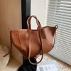 Bolso de Mano Simple Transfronterizo para Mujer 2026 Nuevo Versátil Casual Bolso de Hombro Textura Simple de Lujo Ligero Cesta de Picnic