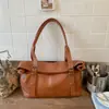Bolsa Transfronteriza de Gran Capacidad para Mujer 2026 Nuevo Bolso de Mano de Nicho para Viajes Diarios Bolso Tote Elegante Simple Bolso de Hombro/Debajo del Brazo