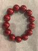 Venta al por mayor de fábrica pulsera de un solo círculo imitación cinabrio étnico hebilla de paz valiente colgante de múltiples estilos pulsera de cinabrio exquisita