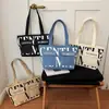 Bolso de hombro para mujer de gran capacidad, bolso tote casual para salidas, bolso de axila versátil con estampado de letras de moda, bolso de nicho y versátil