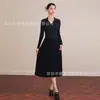 Vestido de punto elegante Nanyou Boutique Elegante con Cintura Definida, Escote en V, Panelado y Dobladillo Amplio