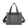 Bolso de nailon impermeable de fábrica para mujer, moda simple, personalidad, bolso bandolera, compras, portátil, versátil, bolso de hombro