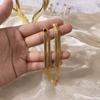 Comercio exterior Taobao joyería INS nicho Europa y Estados Unidos CL2025 hueso de serpiente borla temperamento moda pendientes largos para mujer pendientes