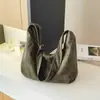 Bolso de mano de gran capacidad modelo nuevo 2026 transfronterizo, diseño de nicho vintage de gamuza, bolso cruzado versátil tipo dumpling
