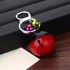 Personalidad japonesa y coreana pintura metálica linda campana hebilla para llaves simple decoración colgante bicolor llavero universal para coche al por mayor