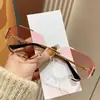 Óculos de sol da moda poligonal sem armação de metal da família Mui Óculos de sol femininos europeus e americanos transfronteiriços Óculos de sol curvos da moda