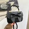 Bolso Cuadrado Pequeño de Mano Moderno y Sencillo Bolso de Lazo de Nicho para Mujer Nuevo Llegado Otoño 2026 Bolso Cruzado de Textura Moderna y Elegante