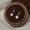 Pendientes de circonita de cuatro puntas versátiles de lujo ligero para mujer, plata pura s999, estilo coreano, tachuelas de plata maciza de moda, pendientes sencillos