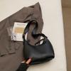 Bolso Popular de Estilo Occidental Bolso de Mujer 2025 Primavera y Verano Nuevo Bolso de Mujer Casual de Hombro Tipo Cubo Color Sólido PU Suave Bolso de Axila