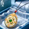 Collar Tanka de Qinghai Regeong Caja Gawu Giratoria de Alto Nivel Chapada en Oro con Accesorios de Tara Verde y Dios Amarillo de la Riqueza en Estilo Chino