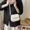 Bolso de diseñador único para mujer 2026 nuevo de moda ins estilo Hong Kong bolso de sillín retro color sólido bolso de hombro cruzado