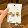 Pendientes vintage usados moda versátil lujo ligero pendientes de alta gama productos de nicho retro fabricante al por mayor tachuelas para orejas