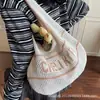 Bolso de Mano Tejido Simple Estilo Coreano Literario para Mujer 2025 Verano Nuevo Retro Hueco con Letra Bolso de Hombro para Axila