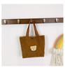 Bolsa de ombro feminina bordada de outono e inverno em malha simples bolsa lancheira bolsa nova bolsa versátil nicho popular fofa