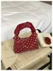 Bolso tipo cubo de lunares estilo coreano nuevo para primavera 2026 para mujer, realza la apariencia, bolso de hombro cruzado, bolso pequeño de moda para el trabajo