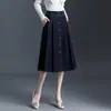 Falda casual de mezclilla línea A para mujer, nuevo estilo otoño 2026, elegante y estilizante, falda de paraguas con dobladillo ancho, falda de longitud media