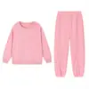 Conjunto de Duas Peças Outono e Inverno 2025 Novo Europeu e Americano Roupas Femininas Top de Gola Redonda com Mangas Longas e Padrão Trançado e Calça Leggings 9918