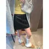 Estilo Urbano Moderno Retro Americano Piel PU Mate Cordón Elástico Cintura Alta Mini Falda de Cuero Mq0707