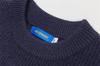 Catálogo invierno Nuevo suéter de punto de marca de moda con costuras para hombre, camisa casual de fondo irregular, suéter de punto de color contrastante