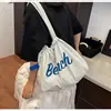 Bolsa Tote Classe Estilo Novo 2025, Grande Capacidade, Versátil para Primavera e Verão, Design de Letras Estiloso, Bolsa de Mão, Bolsa de Ombro, Bolsa de Braço para Mulheres