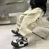 Novas roupas de outono para meninos: Calça casual plissada na frente, com punho ajustável, para crianças mais velhas, 2026 primavera/outono, calça reta solta de algodão, moderna