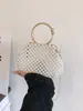 Bolso de mujer de moda transfronterizo, bolso tejido a mano con perlas, bolso de mano de perlas de alta gama, bolso vintage para novia y dama de honor, moderno