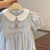Vestido de niña Verano 2025 Nuevo para niña Bebé Elegante Infantil Manga abullonada Moda Rayado Conejo Blanco Falda