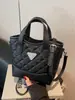 Bolsos populares para mujer de este año 2026 nuevo nicho bordado de diamantes bolso de hombro versátil estilo ins bolso cruzado de hombro