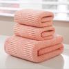 Set de toallas de baño de celosía catiónica auspiciosa al por mayor para comercio exterior, vellón coral de color liso, simple para el hogar, toalla para pareja