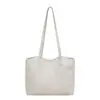 Bolsa de mano estilo coreano retro al por mayor para mujer 2026 Otoño Nuevo Color Sólido Tejida de un solo hombro Bolso para el trabajo Bolso de axila