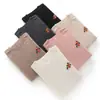 Suéter de punto cálido de cachemira popular de alta gama con cuello redondo bordado 100% cachemira pura, elegante, cómodo, de corte holgado
