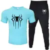 2025 Novo Conjunto Casual Esportivo Masculino de Duas Peças: Camiseta de Manga Curta e Calça, Verão, Gola Redonda, Cor Lisa, Estampado