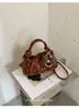 Bolso de lunares para mujer 2026 nuevo estilo verano exquisito para salir bolso de mano pequeño textura de alta calidad un solo hombro bandolera bolso tipo empanada