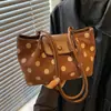 Bolsa Transfronteiriça Coreana de Nicho com Bolinhas Feminina Novo Estilo Outono 2026 Versátil para o Dia a Dia Bolsa de Ombro Casual Bolsa de Braço