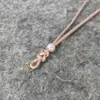 Nudo de Paz Estilo Chino Tejido a Mano Perla Artificial Colgante para Bolso Joyería Venta al por Mayor