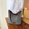 Bolso cubo tejido de estilo coreano vintage transfronterizo para mujer, nuevo y moderno bolso de mano versátil para el verano 2026, bolso de hombro, bolso cruzado