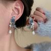 Pendientes de perlas con alas de mariposa de súper hada para mujer, de moda para otoño e invierno, diseño de nicho, pendientes de alta calidad, ligeros, lujosos, elegantes y elegantes, joyería para las orejas.