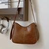 Bolso de axila retro de alta gama para mujer, nuevo bolso de hombro de moda 2024, versátil y popular bolso bandolera tipo cubo