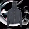 Sudadera con capucha y cremallera estilo retro americano 2026 con retazos, lavada, teñida con cera, chaqueta con capucha