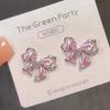 Pendientes de perlas con lazo rosa para mujer, primavera y verano 2023, elegantes, de alta gama, ligeros y lujosos.