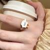 Anillo de Pata de Gato de Dibujos Animados Lindo Perla al por Mayor Diseño de Nicho Juguetón Dulce Versátil Cara Sonriente Anillo de Pan para Mujeres