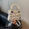Bolso bandolera pequeño con textura de color liso para mujer, primavera 2025, nuevo bolso de mano con entramado de diamantes, bolso de hombro de moda