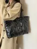 Bolsa de plumífero de gran capacidad transfronteriza para mujer, nuevo bolso tote de moda versátil de nicho estilo bolso de hombro único, Otoño