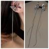 Pendientes de clip con borla de mariposa y diamantes de plata sin agujeros para mujer, elegantes y fríos, de alta gama y largos.