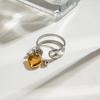 Anillo de acero inoxidable Wanxing de estilo europeo y americano, con personalidad a juego, dorado y plateado, con apertura hueca y amor, anillo de acero de titanio, joyería transfronteriza.